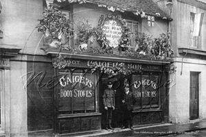 Caigers Boot Store in Peach Street, Wokingham, fully decorated for the Peace Celebrations at the end of WWI