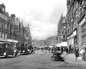 Broad Street with what appears to be a Taxi rank in the middle of the road, Reading in Berkshire c1920s