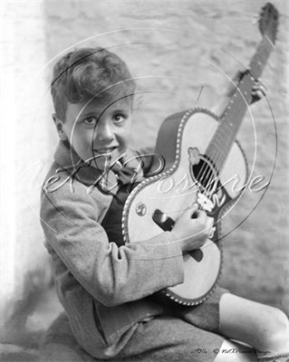 Picture of Misc - Kids, Boy Playing a Guitar c1930s - N743