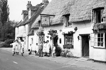 Morris Dancers, The A Team outside the Elephant Pub, Bampton in Oxfordshire c1960s